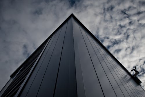 Free Worm's Eye View of Building Under White Cloudy Sky Stock Photo