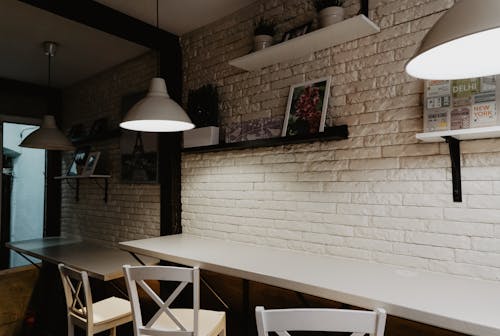 White Wooden Chairs Near Table