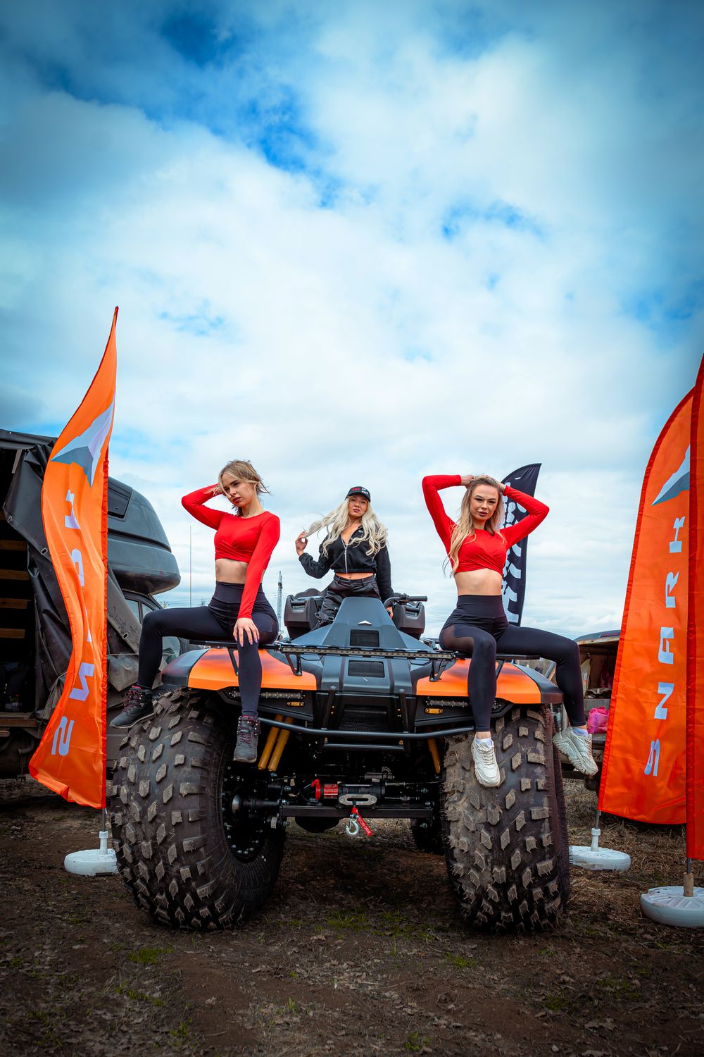 Female Atv Racers Three women posing on a four wheeler atv · Free Stock Photo