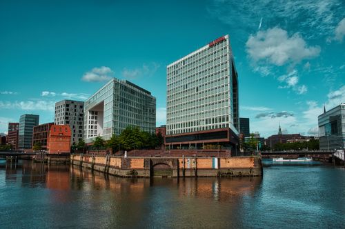 Free Stunning view of Hamburg's contemporary buildings by the Elbe River, showcasing urban architecture. Stock Photo