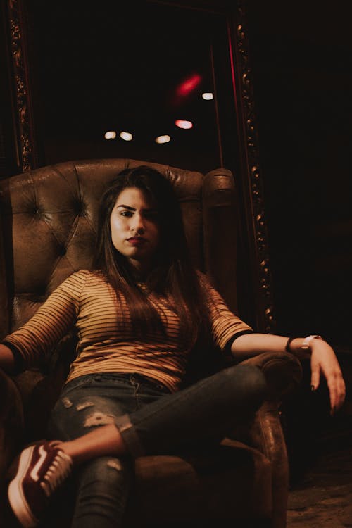 Photo of Woman Sitting On Chair