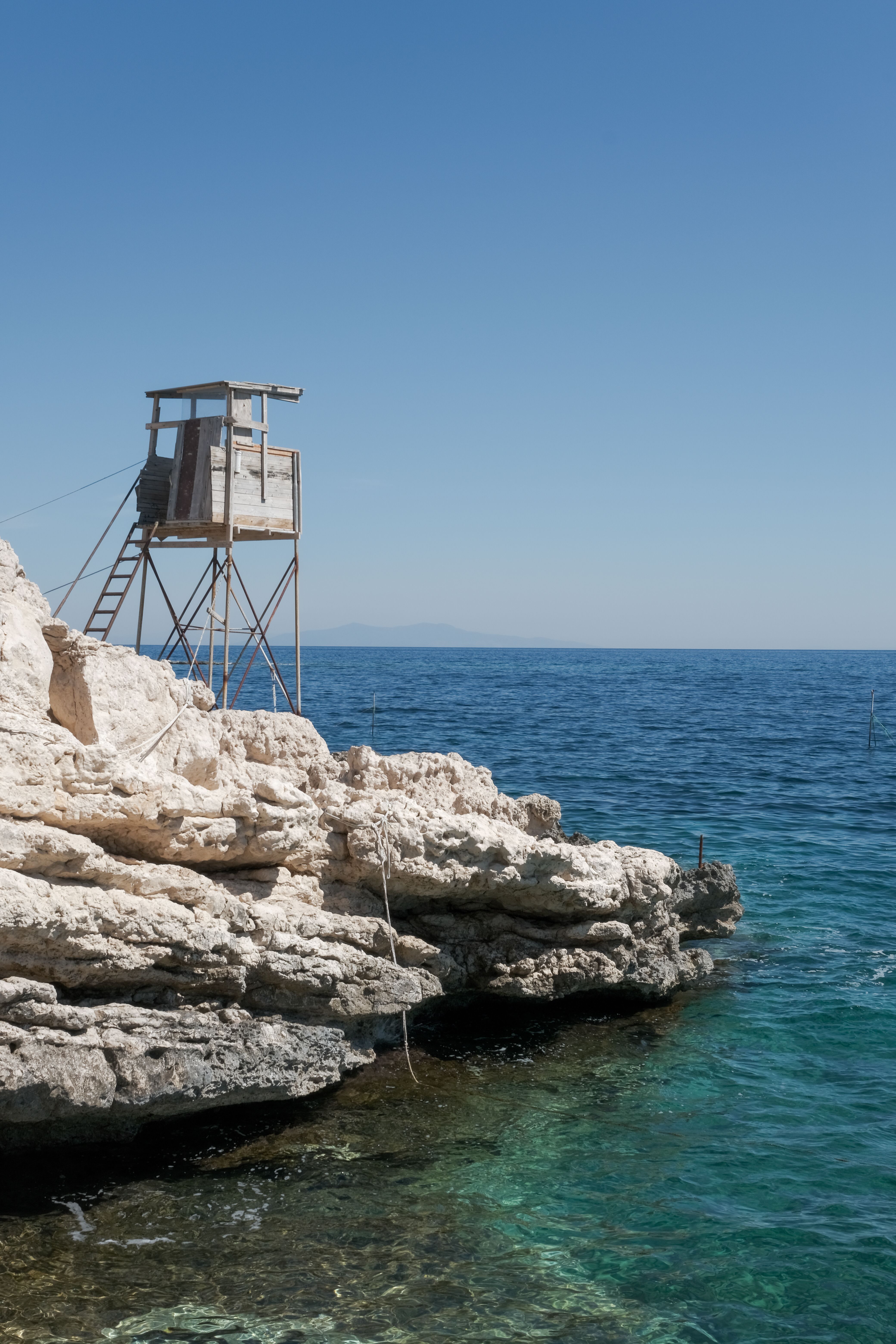 Lifeguard Tower on Rocks on Sea Shore · Free Stock Photo