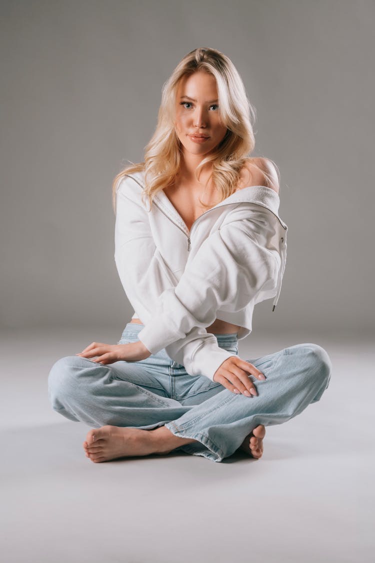 Blonde Woman Posing In Studio 