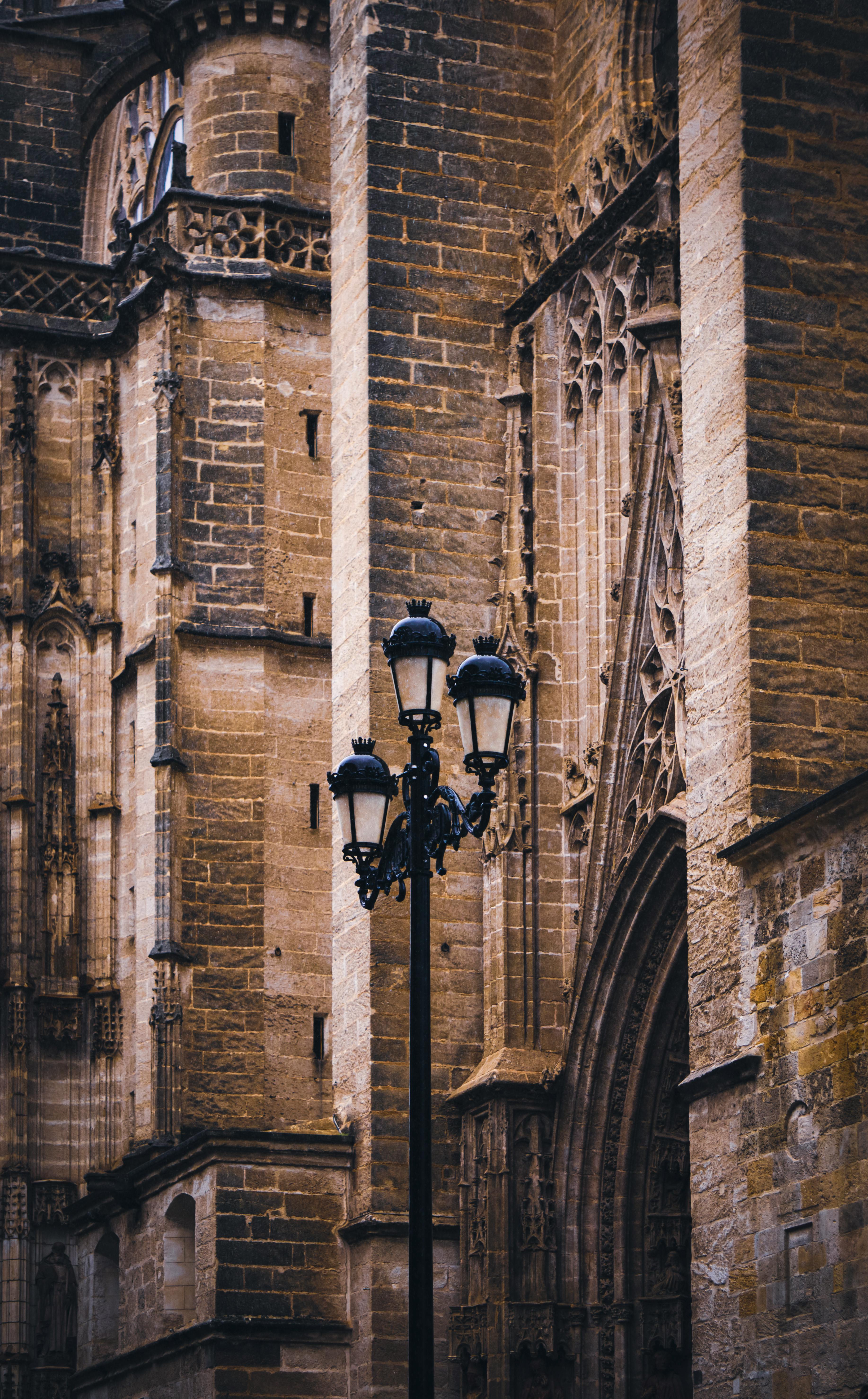 lantern in front of a brick building