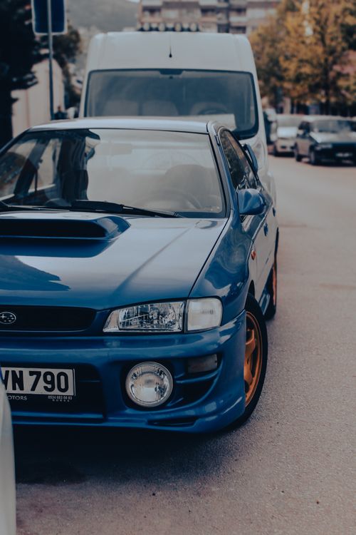 Free A close-up shot of a parked blue Subaru sports car in an urban street of Bursa, Türkiye. Stock Photo