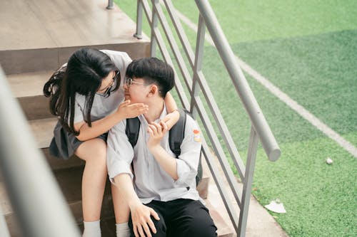 Couple Hugging on Stairs