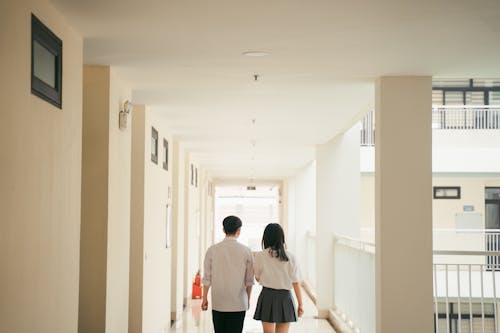 Back View of Couple Walking Together