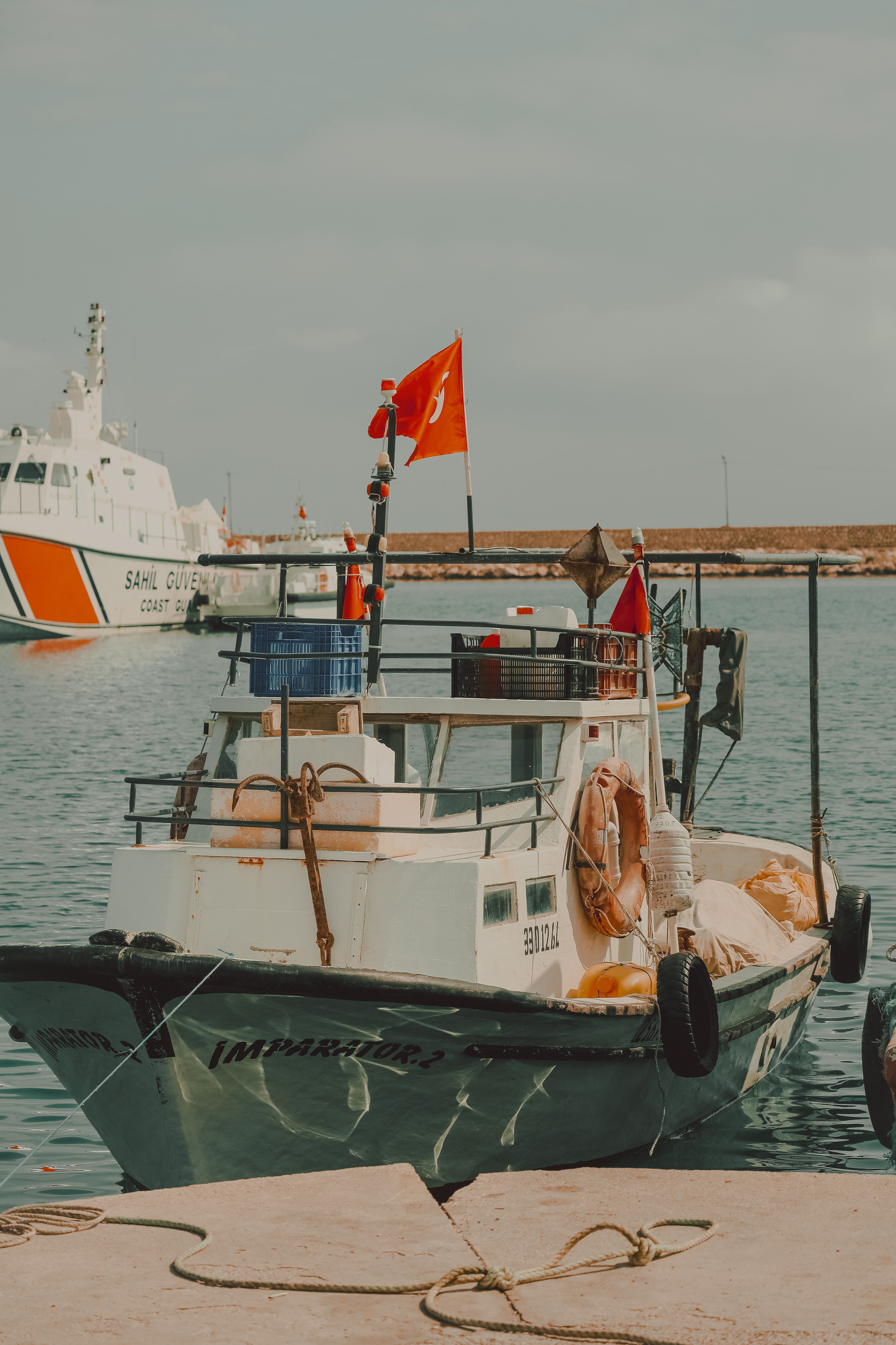 Motorboat Moored on Sea Shore · Free Stock Photo