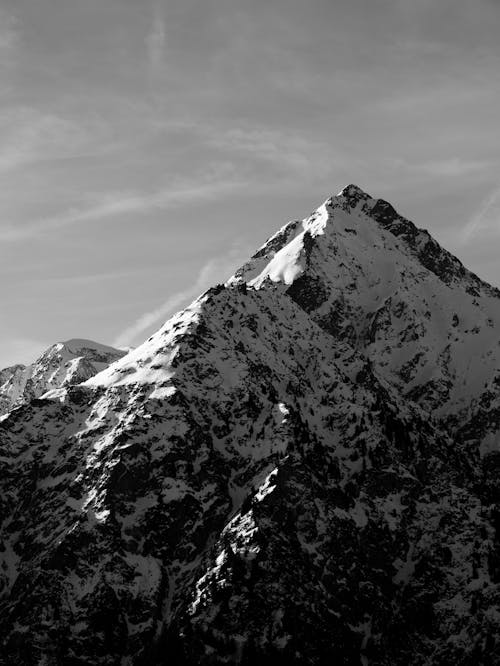 Black and white photograph of a snowy mountain