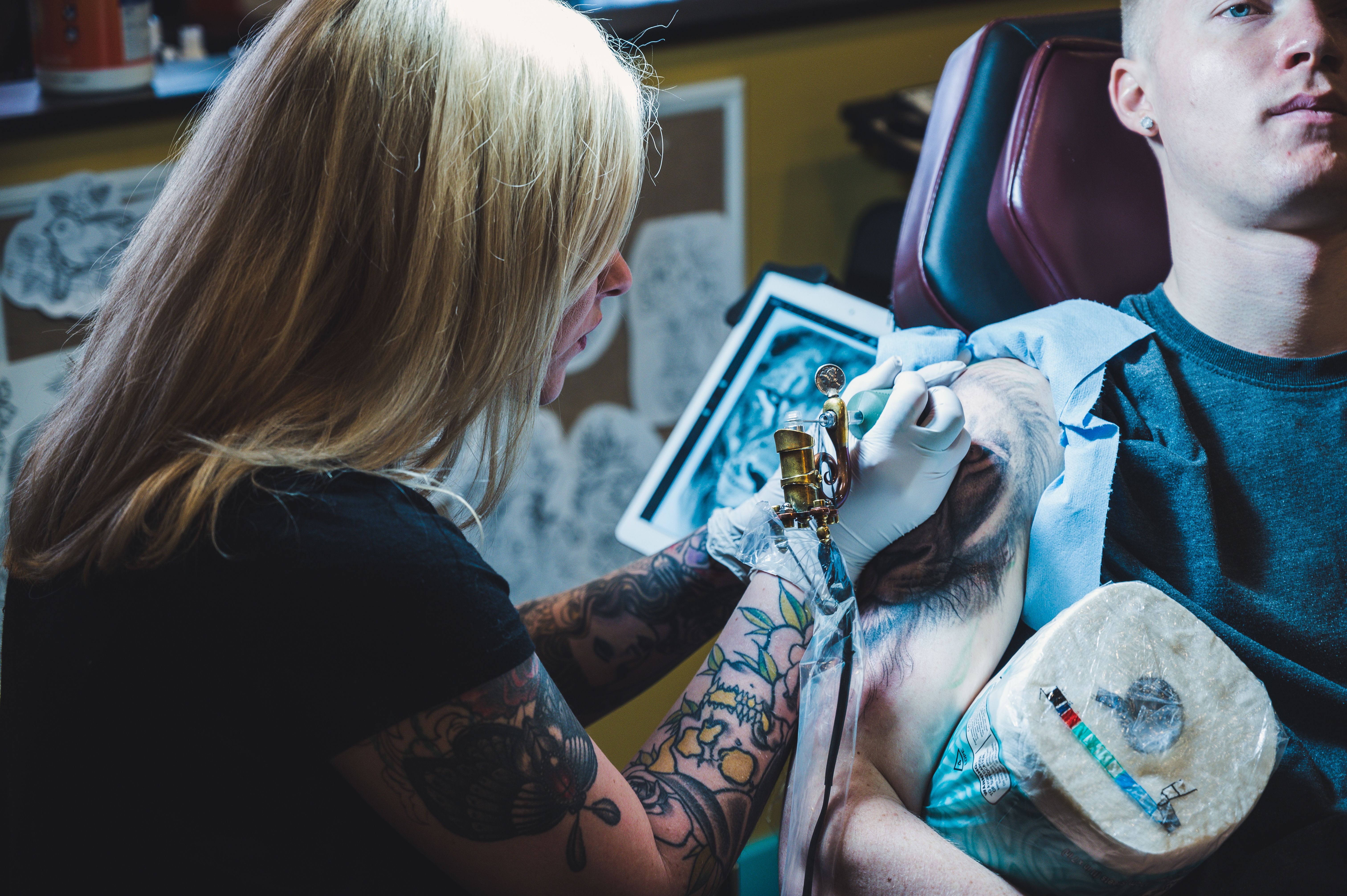 female tattoo artist