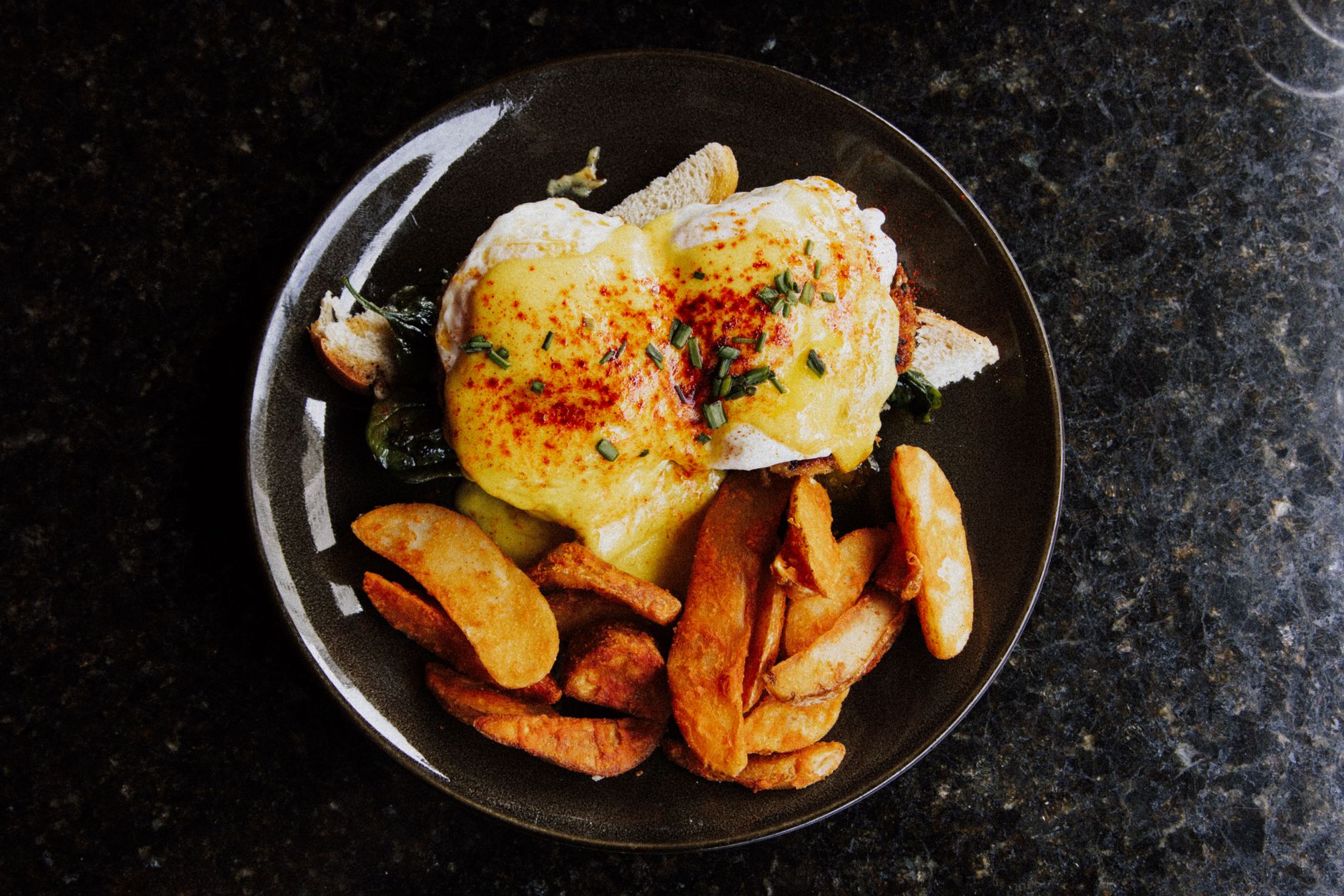 Freshly cooked blackstone breakfast potatoes with parsley garnish