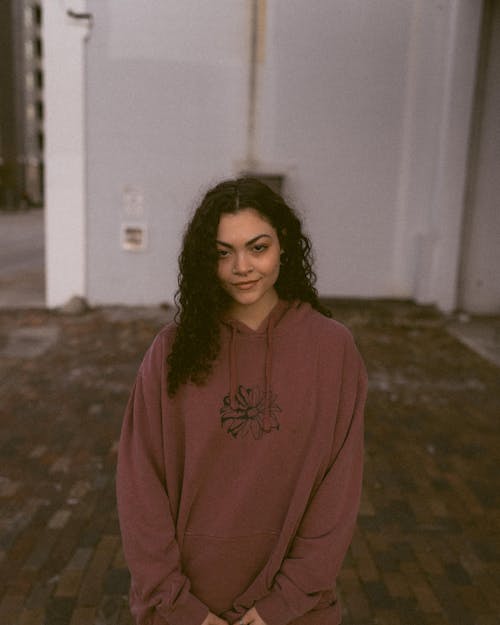 Portrait of Brunette Woman in Hoodie