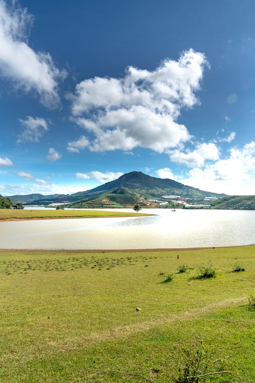 White Clouds over Mountain and Lake