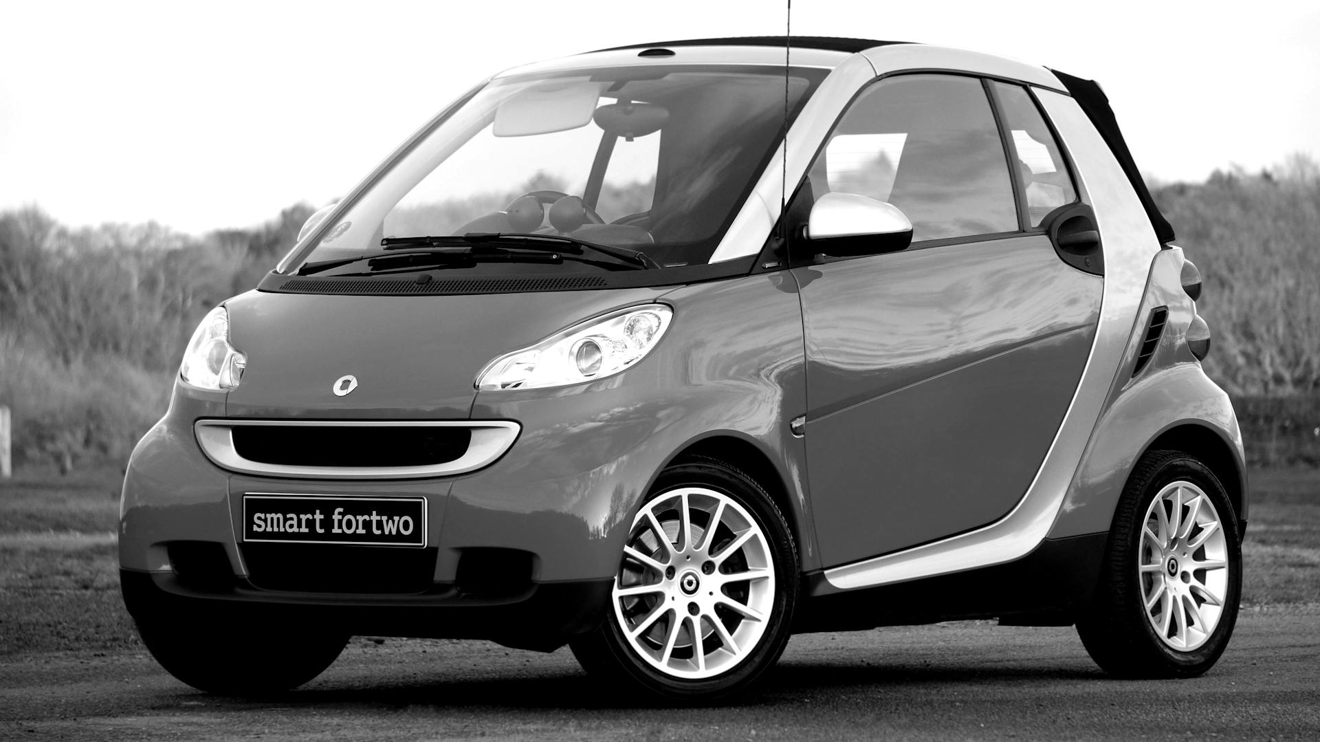 Grayscale Photo of Smart Fortwo