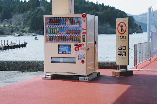 Kostnadsfri bild av dryck, godisautomat, sjöstrand
