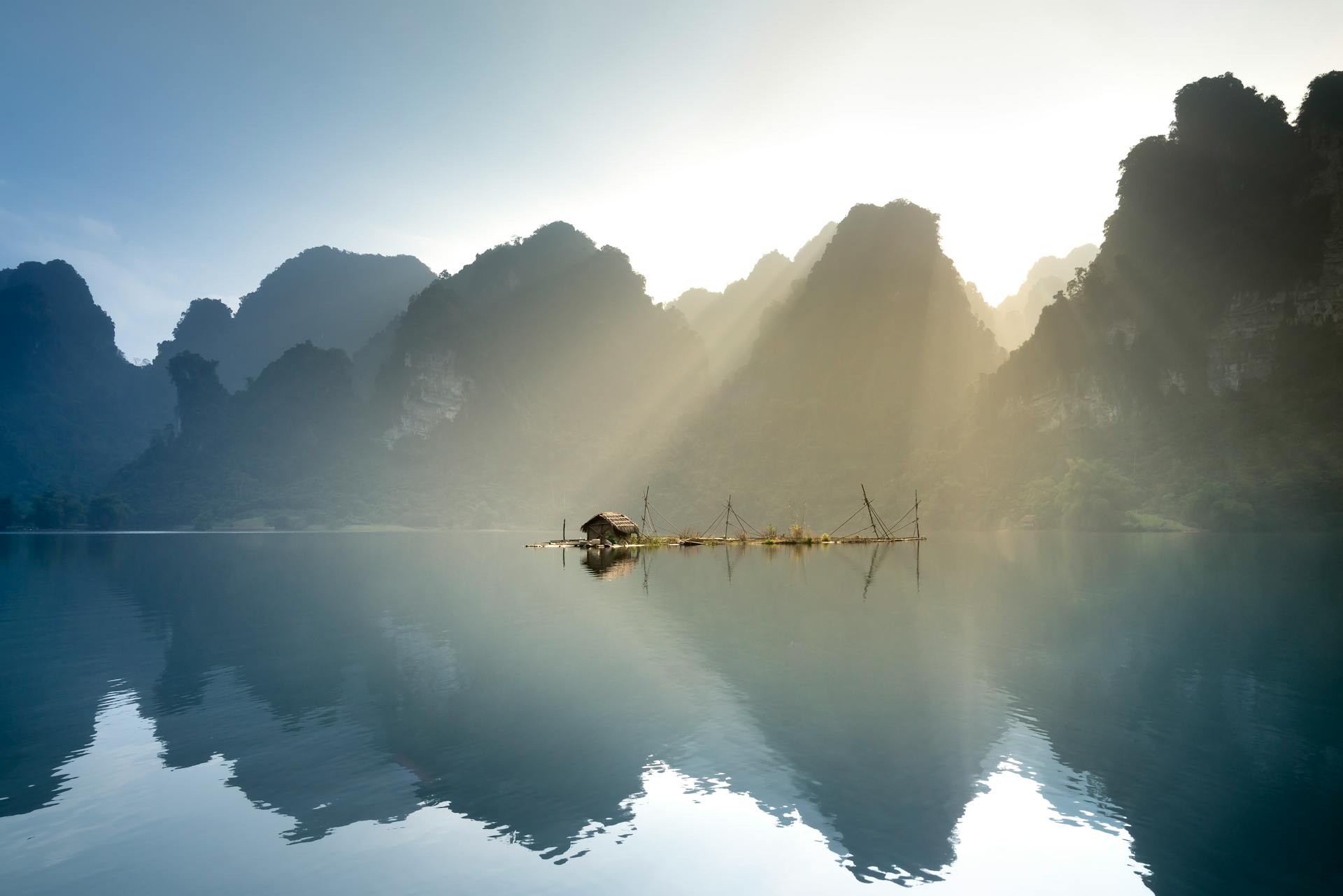 Landscape Photography of Brown Wooden House on Body of Water