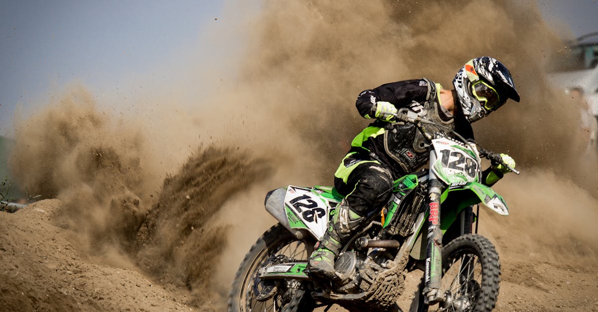 Rider Riding Green Motocross Dirt Bike