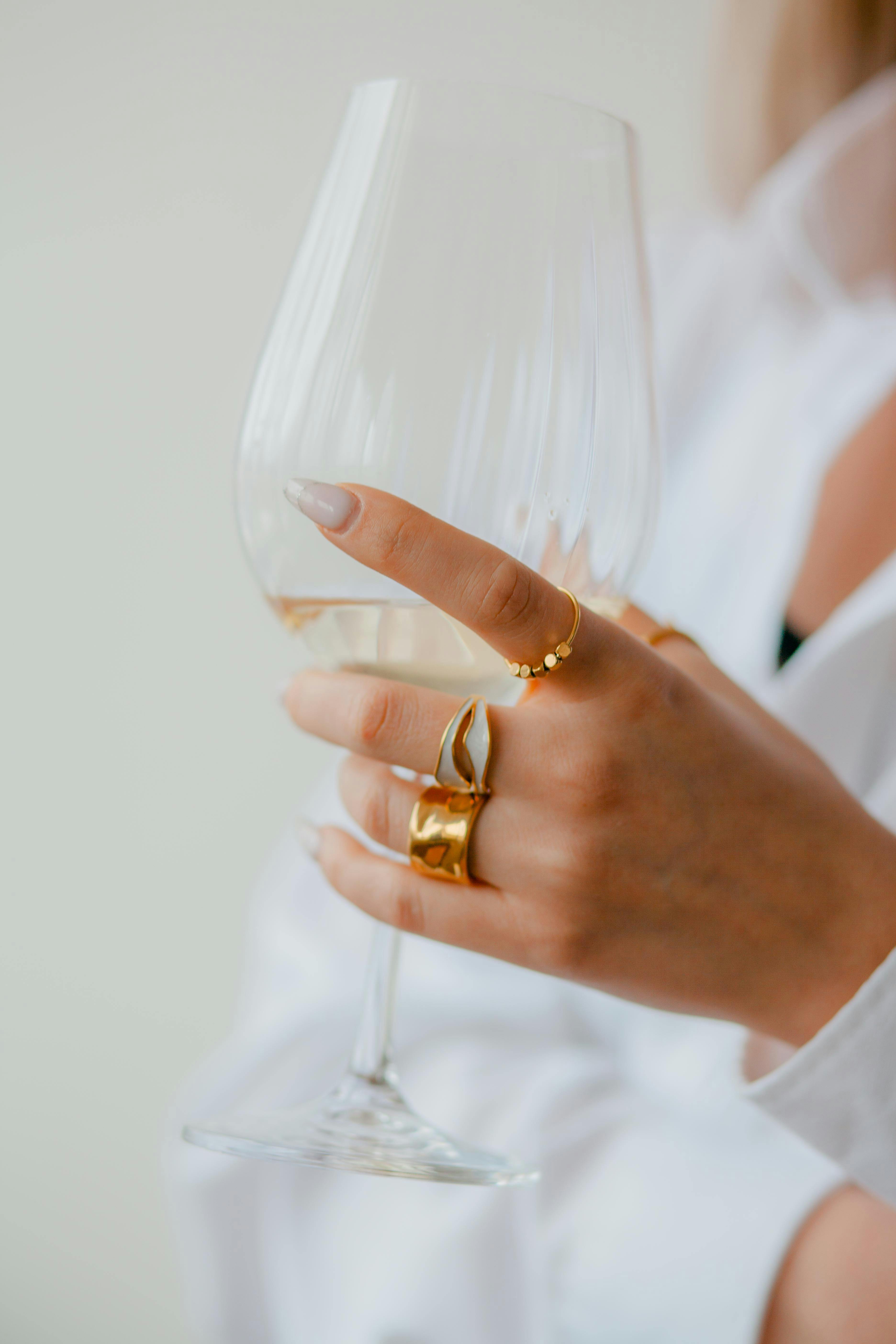 glass of champagne in woman hand