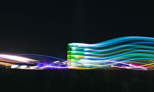 A long exposure photograph of a building with lights