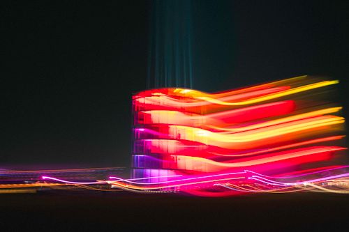 Free Vibrant abstract urban scene showing blurred multi-colored lights at night. Stock Photo