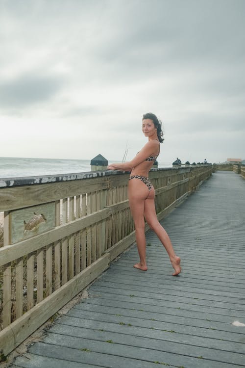 Woman in Bikini on Promenade