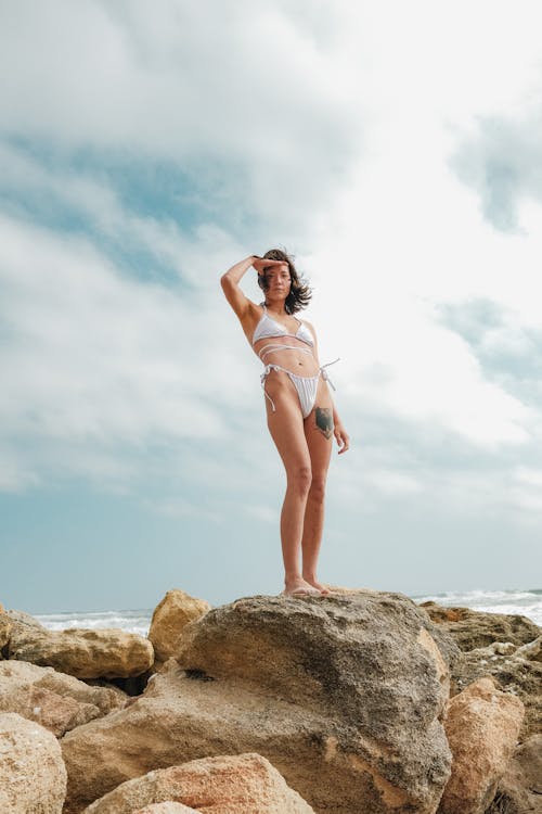 Woman in Bikini on Rock