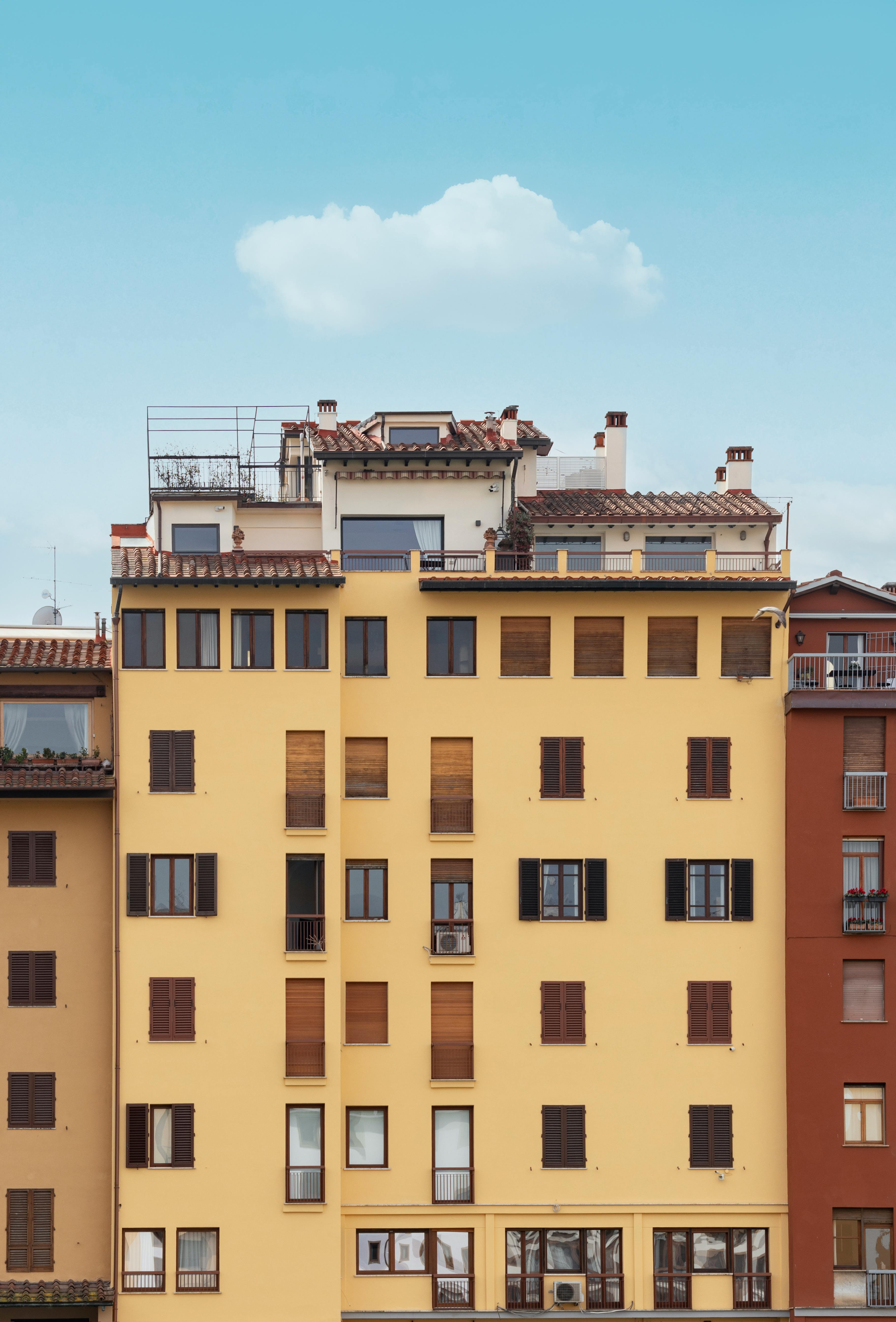 Vibrant yellow and brown buildings in urban Florence, Italy.