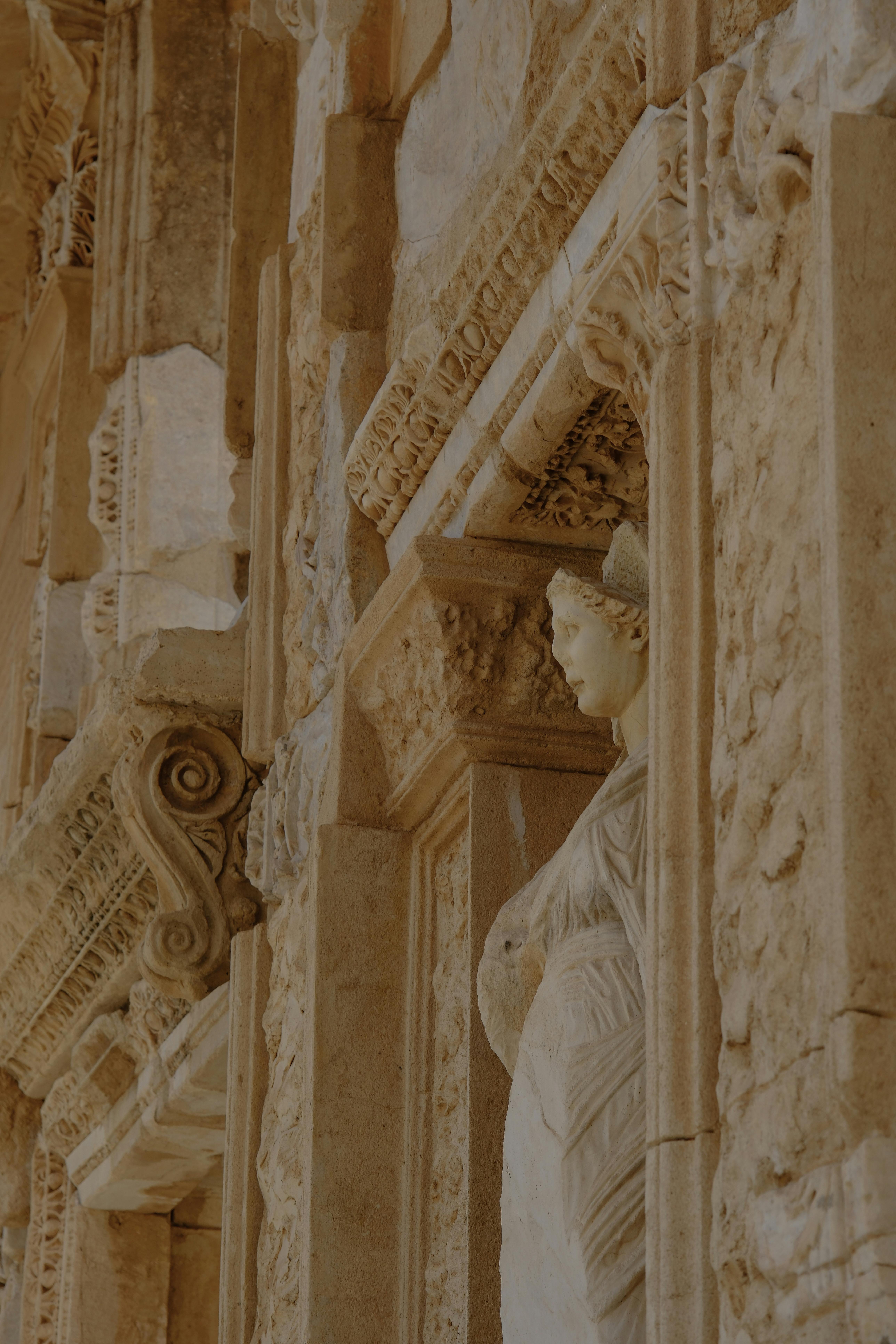 Intricate stone carvings and statues adorn the historic Library of Celsus in Izmir, Turkey.