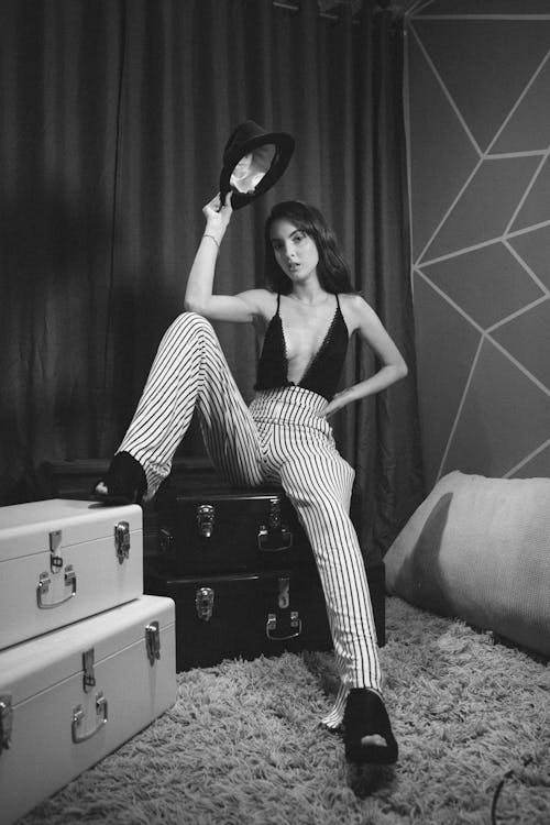 Monochrome Photo Of Woman Wearing Striped Pants