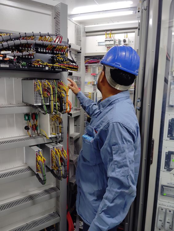 professional electrician installing electrical system