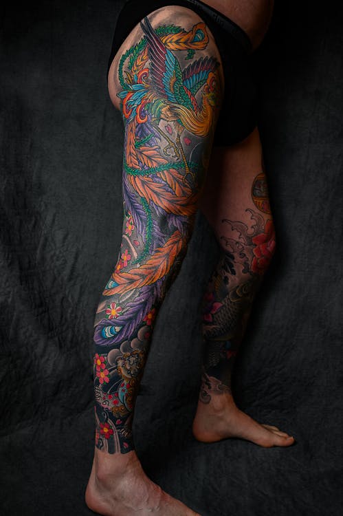 Person With Floral Leg Tattoo Standing · Free Stock Photo