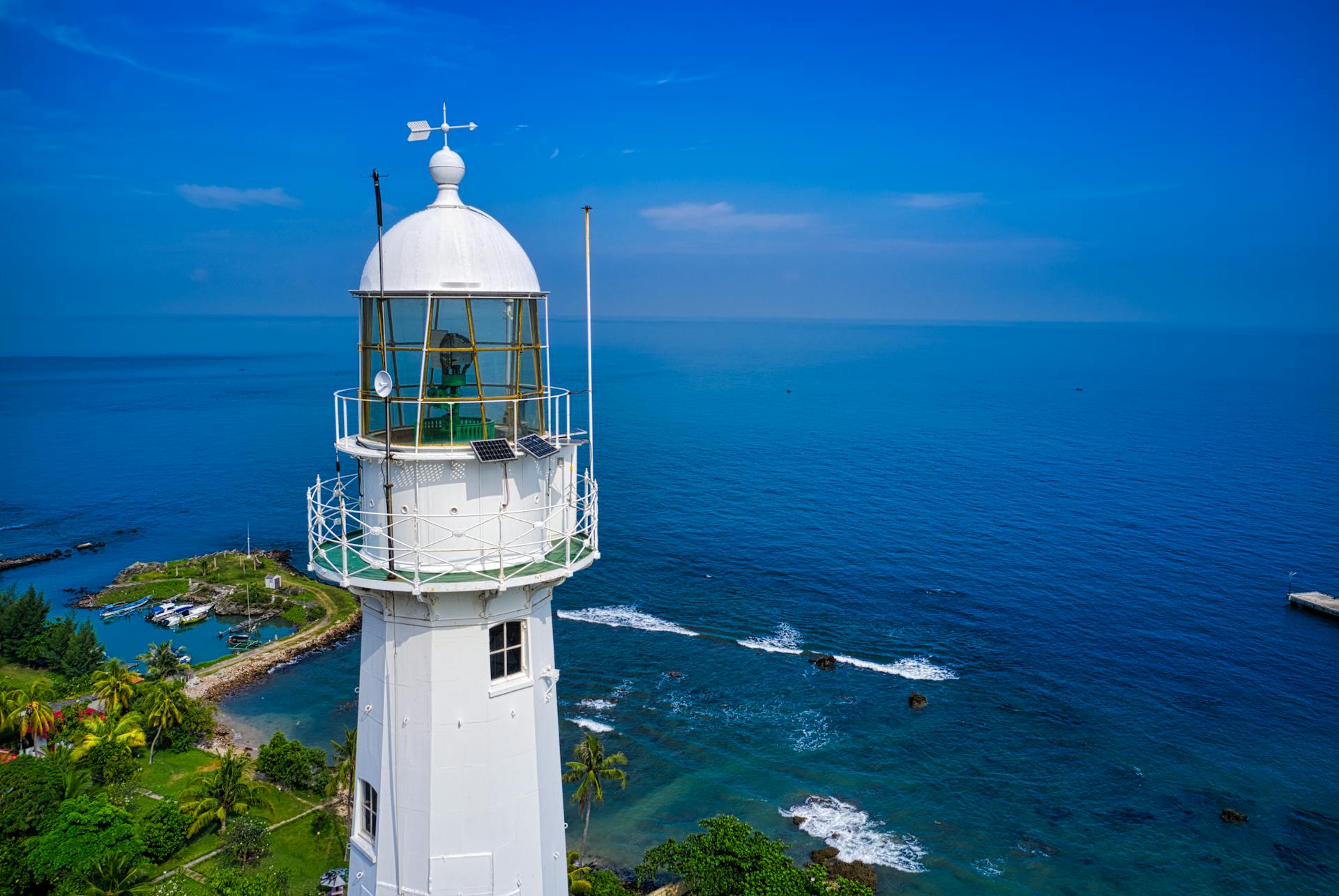 Aerial Photography of Lighthouse by the Sea