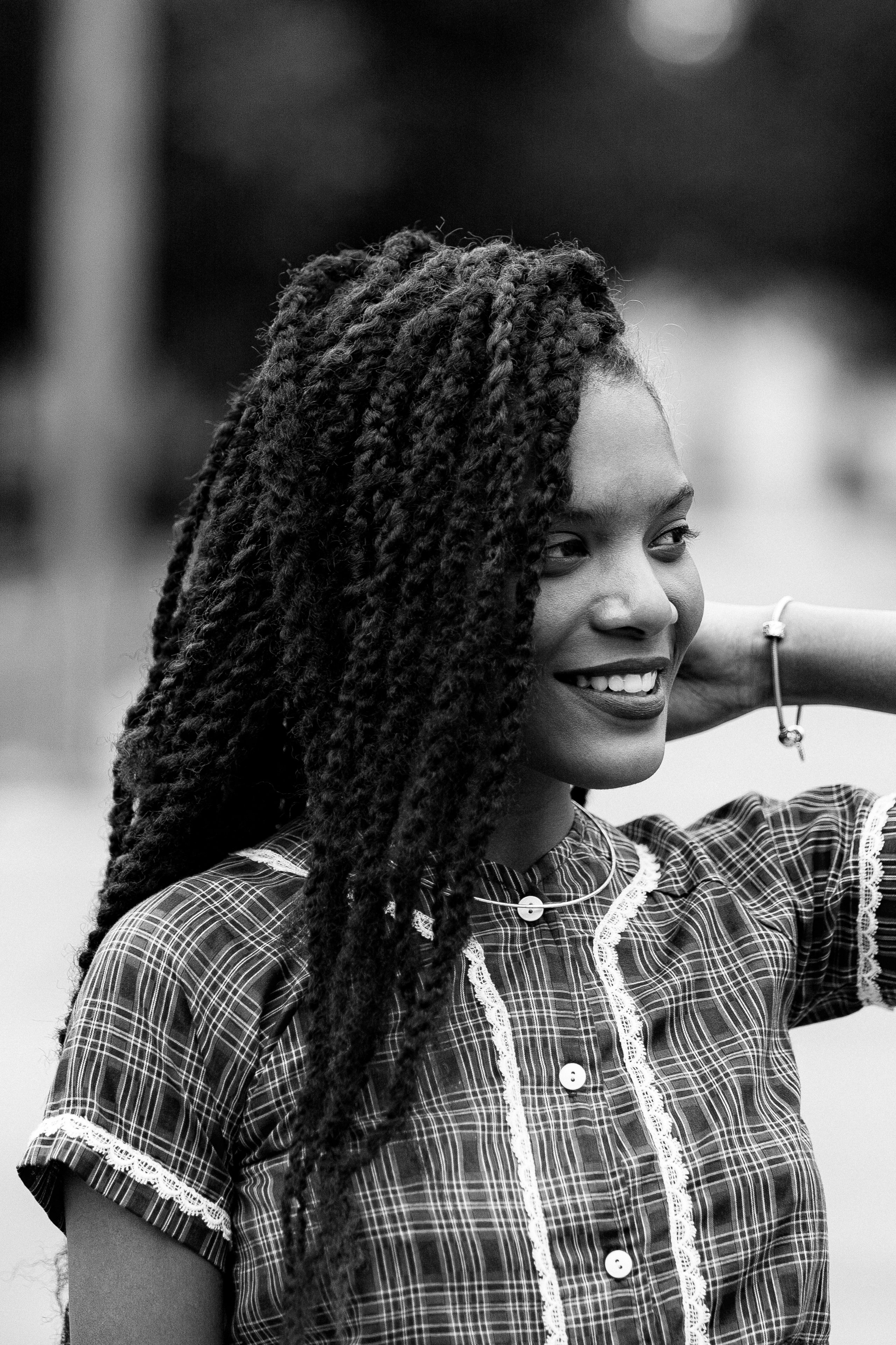 Portrait of Smiling Woman with Braided Hair · Free Stock Photo