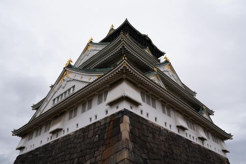 Free Stunning view of Osaka Castle showcasing its traditional Japanese pagoda-style architecture. Stock Photo