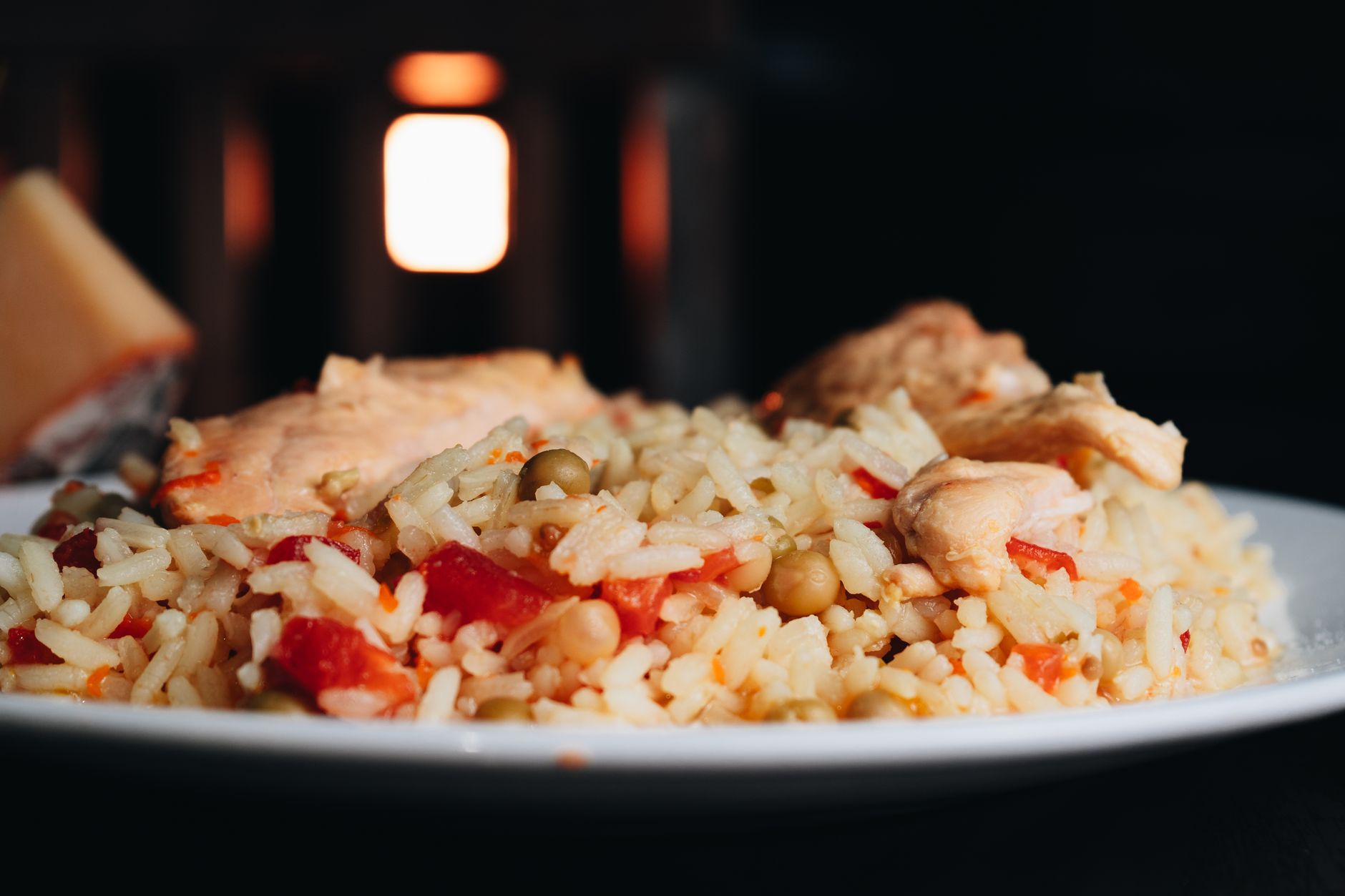 Sizzling chicken and vegetables cooking in pan with vibrant colors