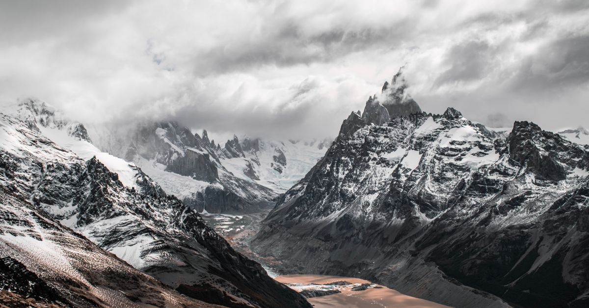 Stunning winter mountain landscape in El Chaltén, Argentina with snow and scenic peaks.