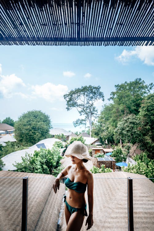 Woman Wearing Bikini and Sun Hat