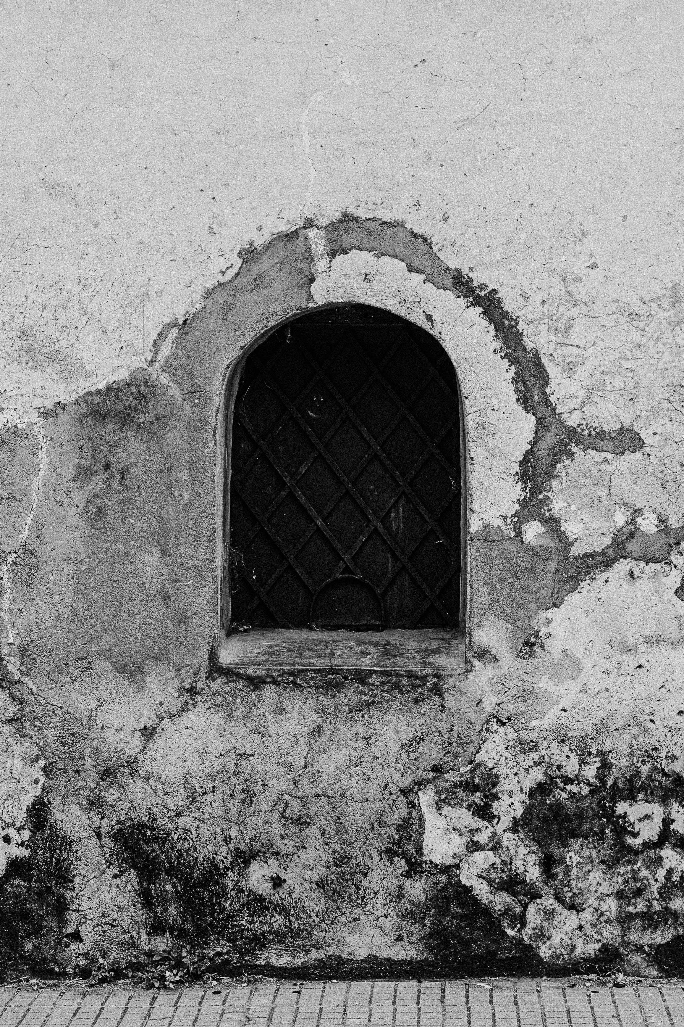Black and White Photo of a Small Window in an Old Building · Free Stock ...