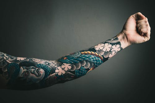 Foto Del Brazo Izquierdo Con Tatuaje