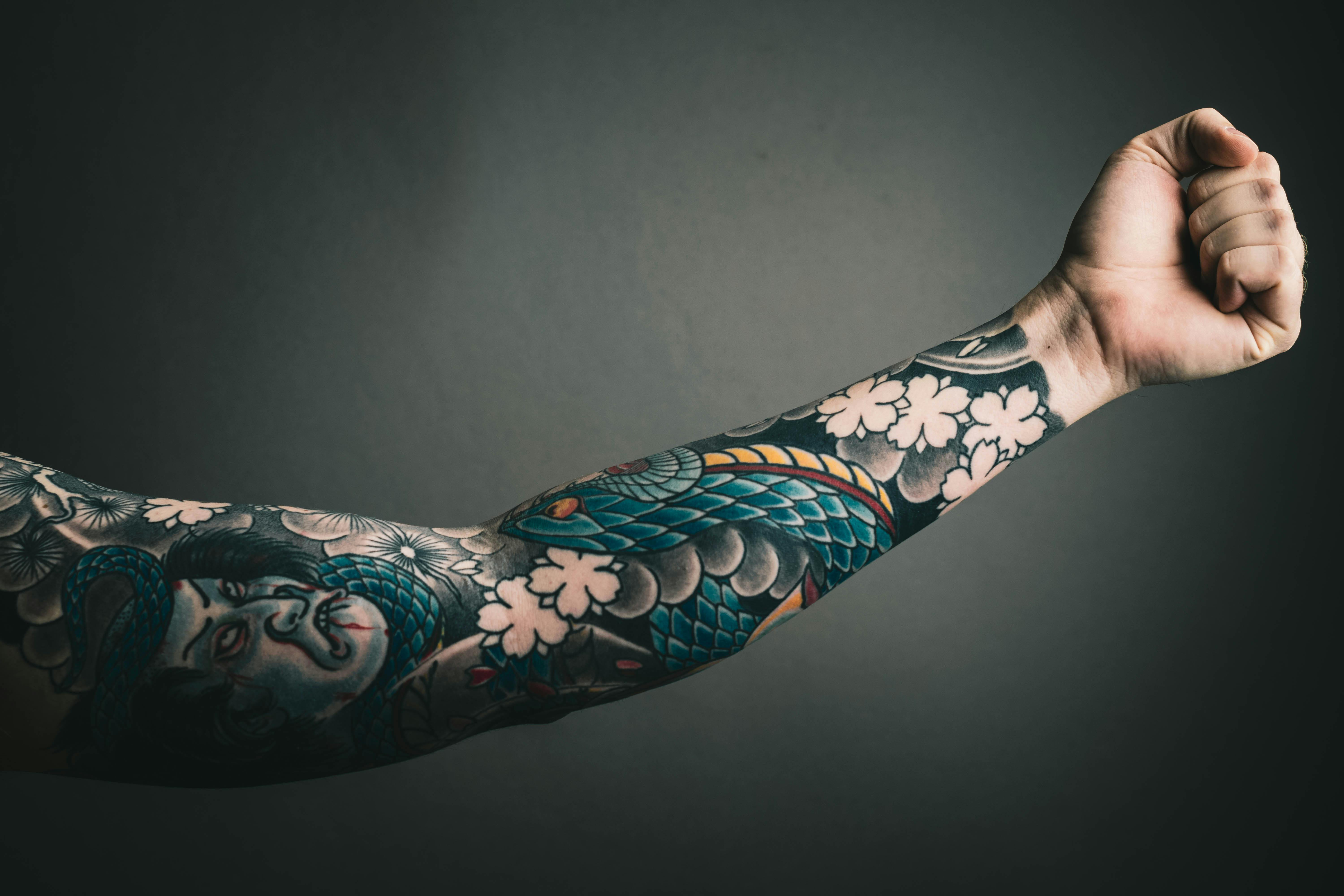 Photo of Left Arm With Tattoo · Free Stock Photo