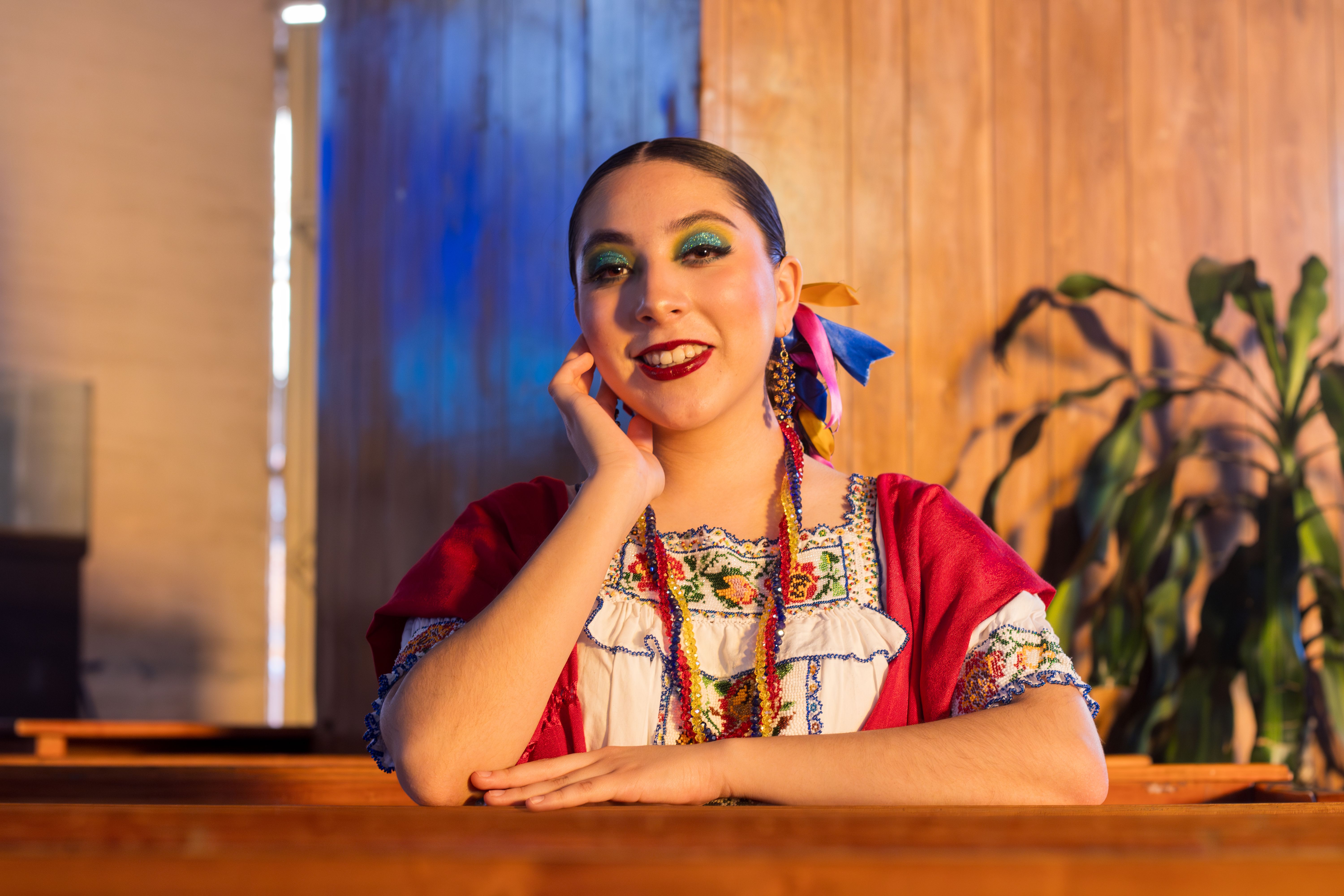 Smiling Woman in Traditional Clothing · Free Stock Photo