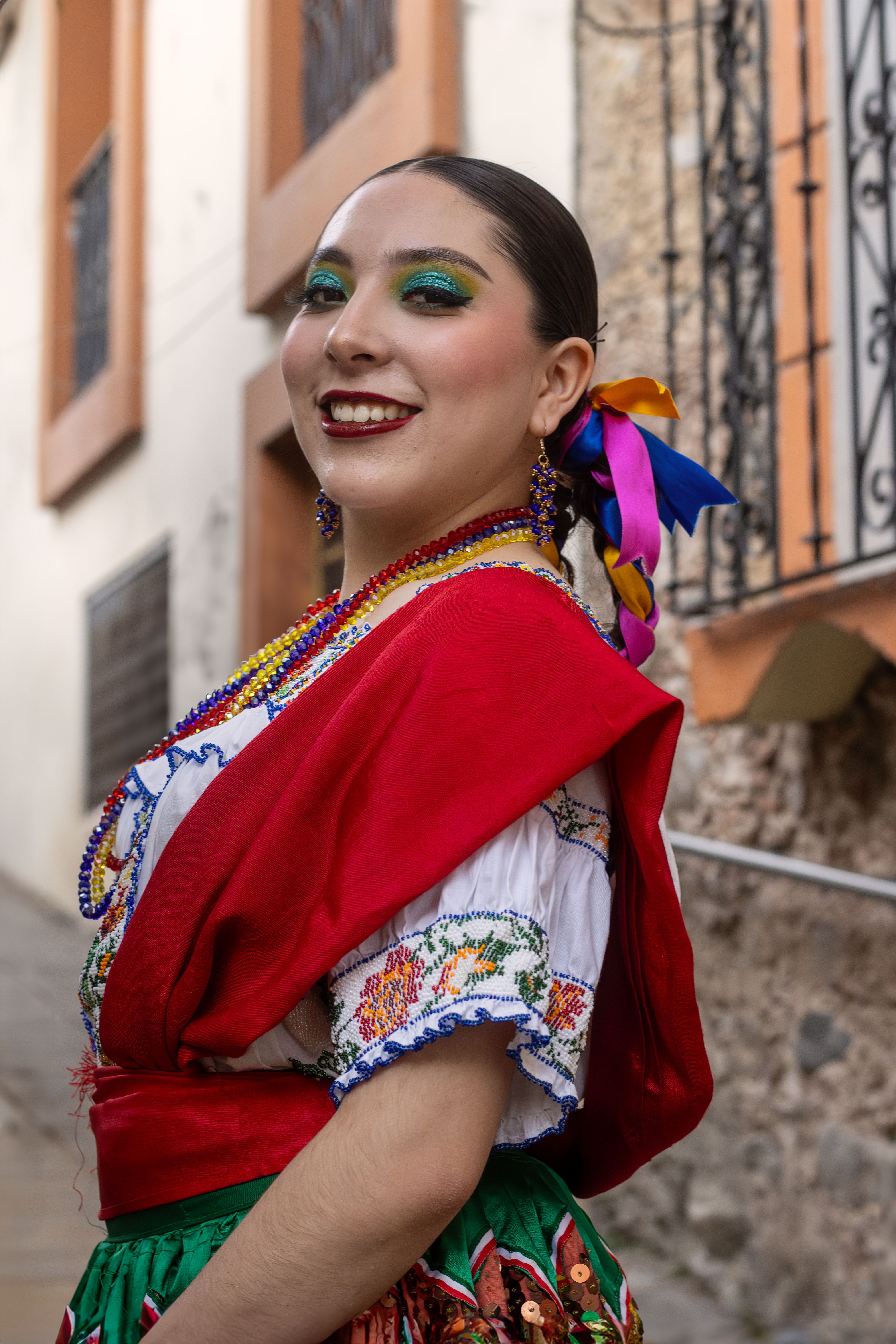 Smiling Woman in Traditional Clothing · Free Stock Photo