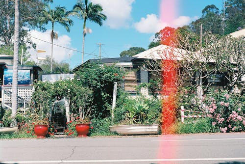 A red light is shining on a house