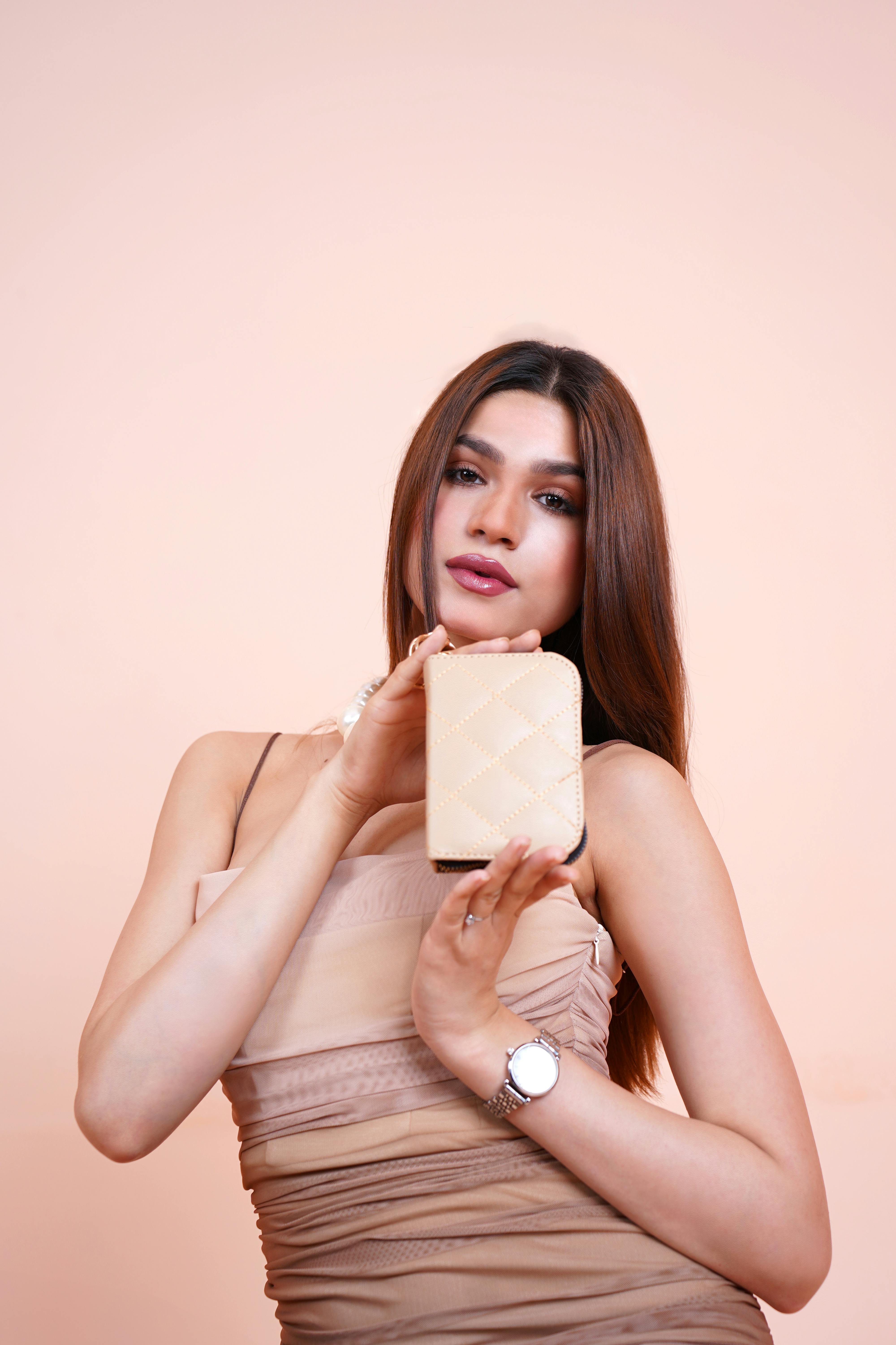 portrait of woman with wallet