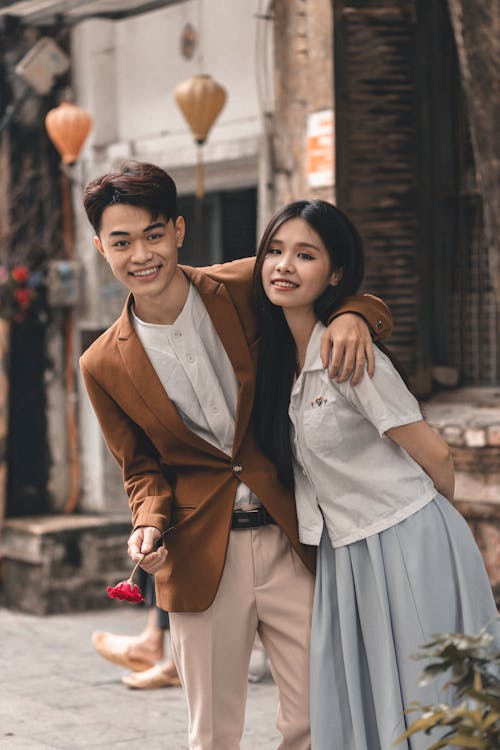 Free Smiling Couple Standing Together Stock Photo