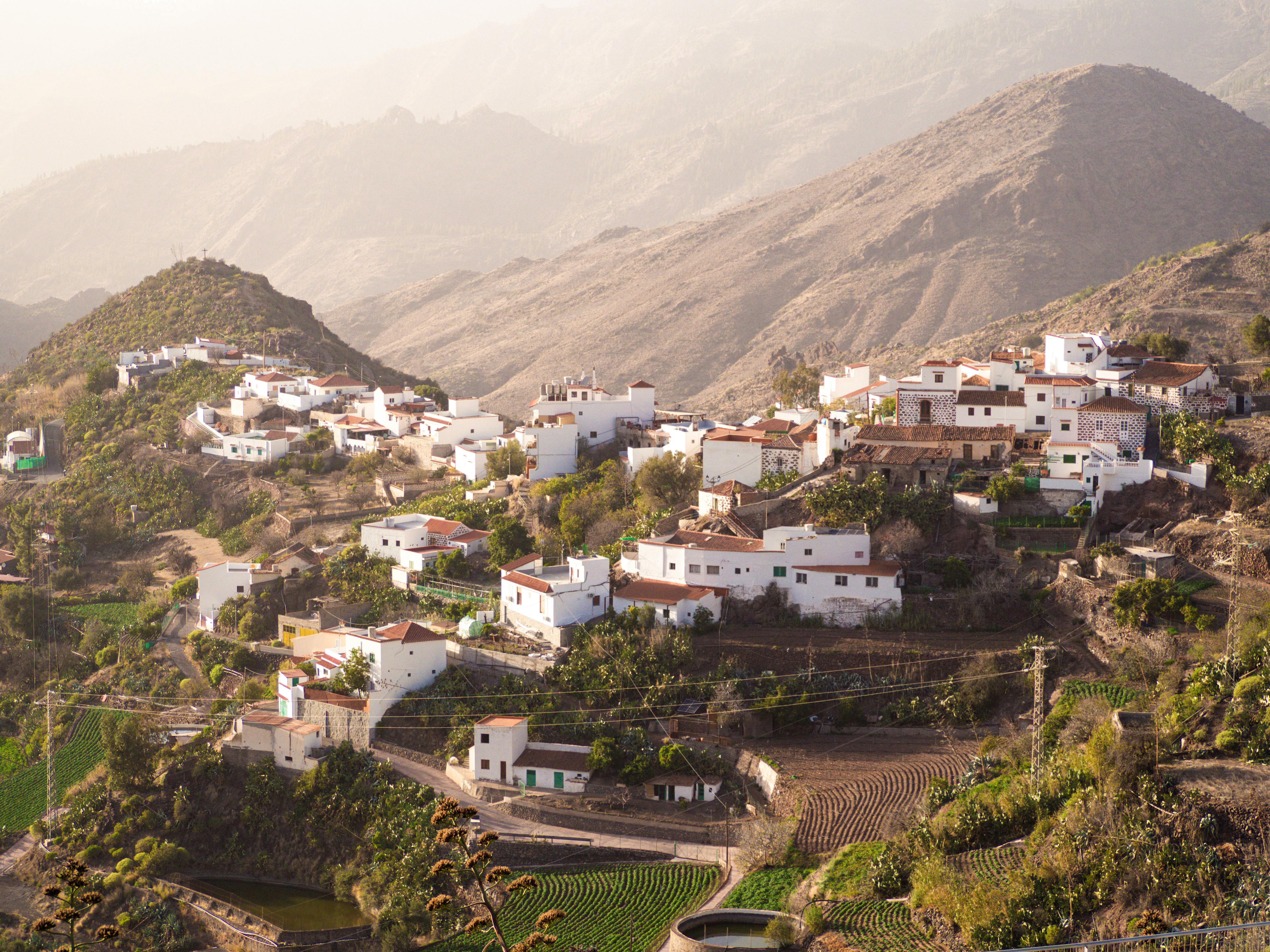 Charming aerial view of Tejeda Village nestled among hills in Canary Islands.