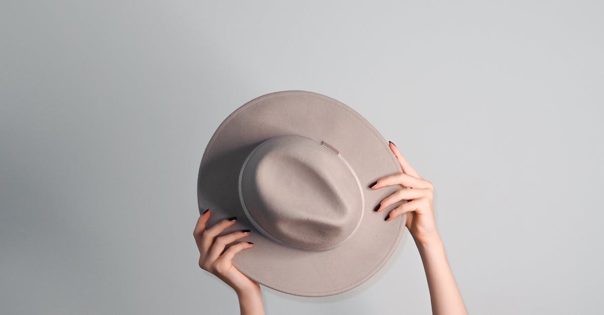 Woman Hands Holding Hat · Free Stock Photo