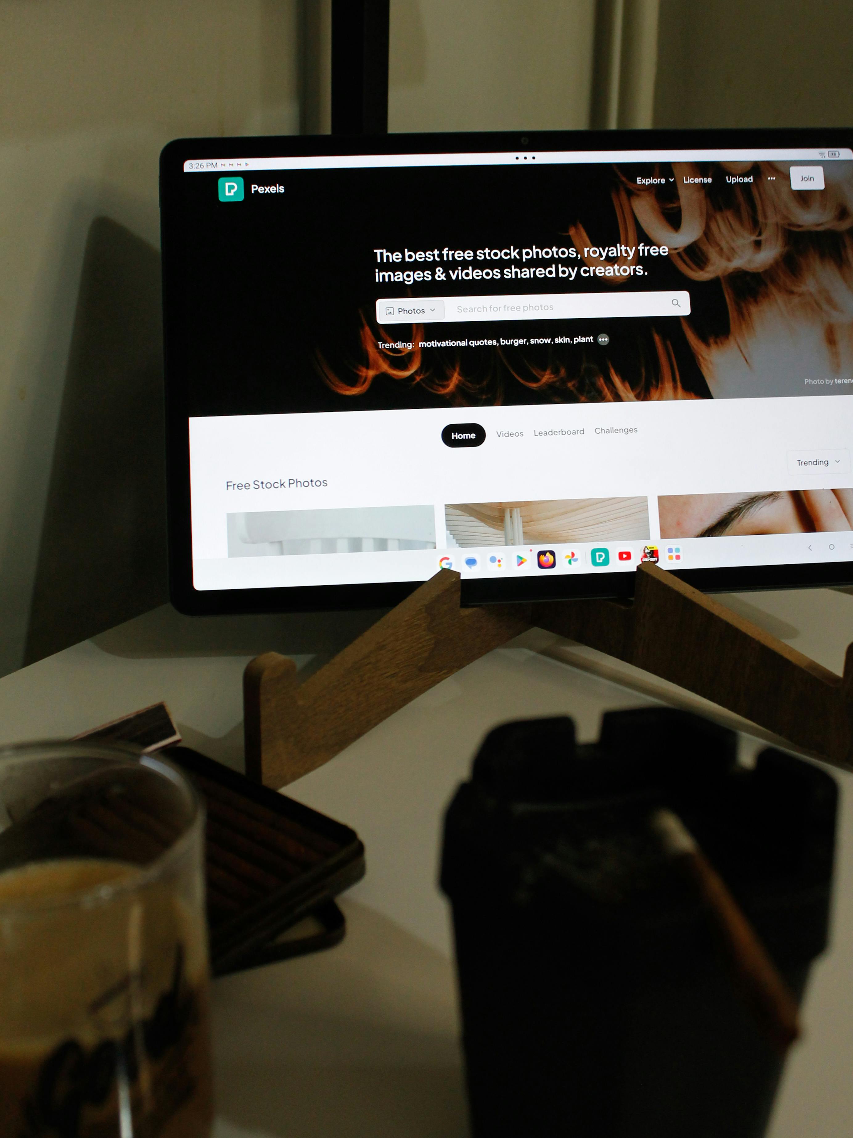 A stylish office setup featuring a laptop and coffee, perfect for business environments.