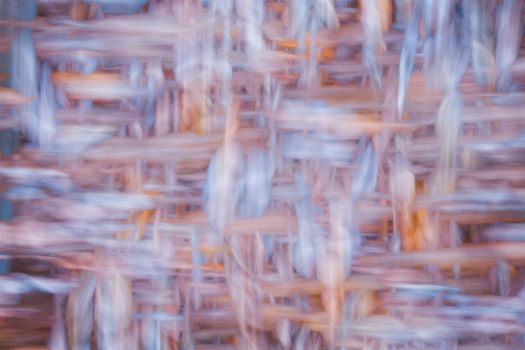 A captivating abstract image featuring a blend of woven textures with soft, muted colors.