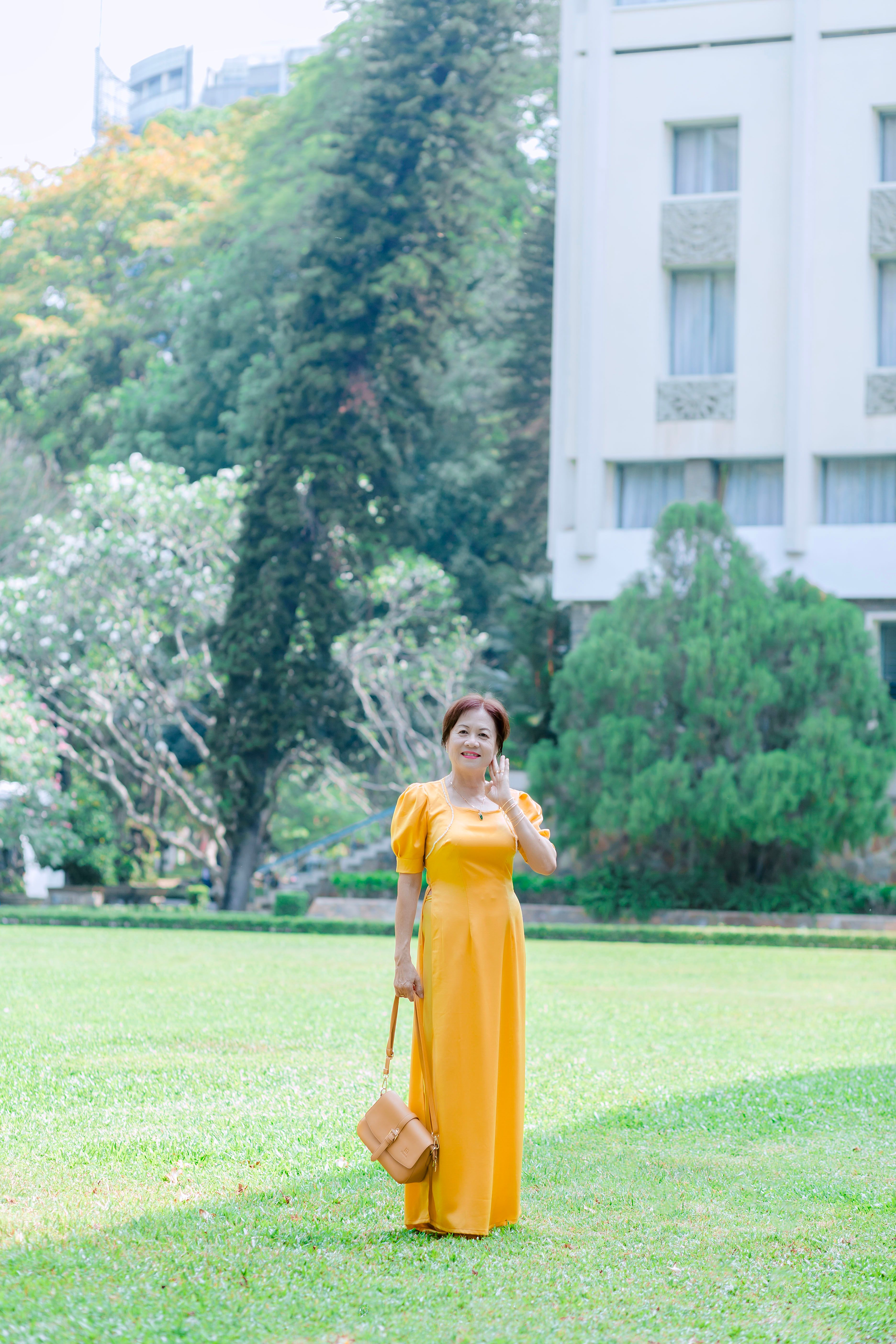 Woman Wearing Yellow Dress in a Park · Free Stock Photo